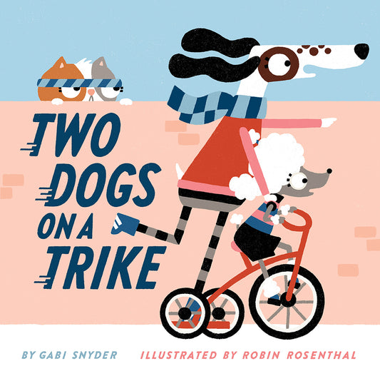 Deux chiens sur un tricycle